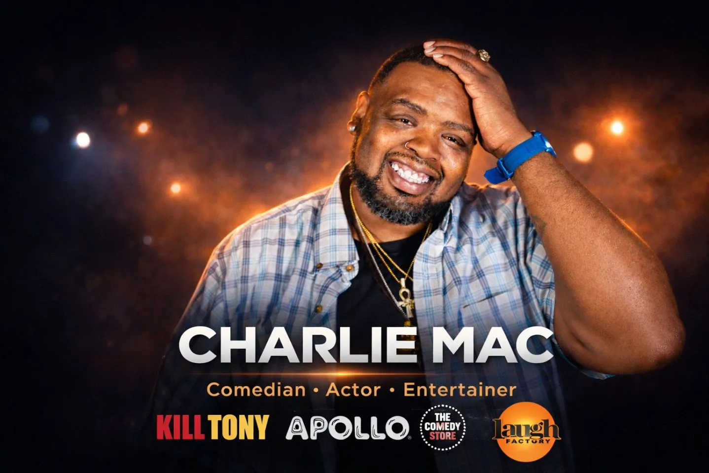 Charlie Mac smiling on stage